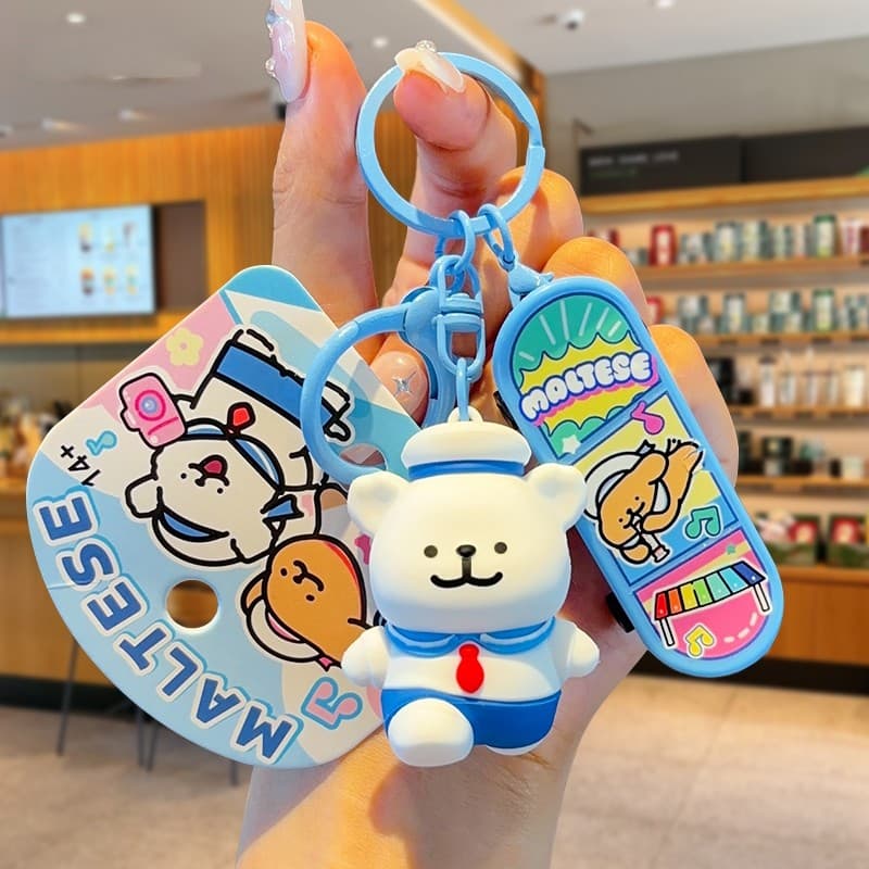 Linha genuína filhote de cachorro Scooter carro chaveiro boneca mochila pingente casal dos desenhos animados bonito bone
