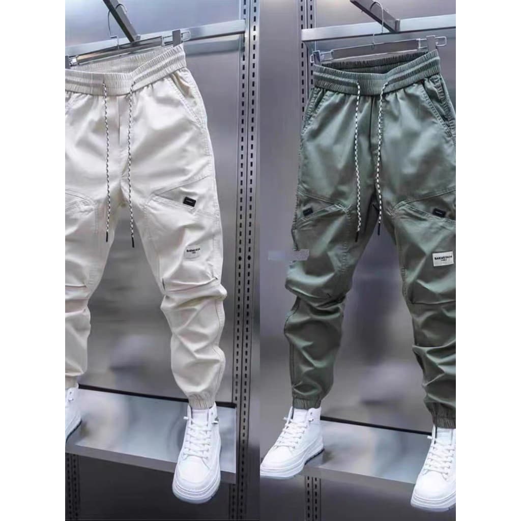 Calças casuais masculinas primavera verão 2026 novo estilo macacão na moda marca magro-ajuste preto All-match calças esp