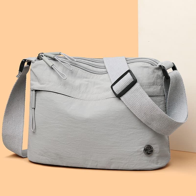 2025 novo estilo simples pano de náilon senhoras multi-camada bolsa de ombro All-Match saco do mensageiro multi-camada C