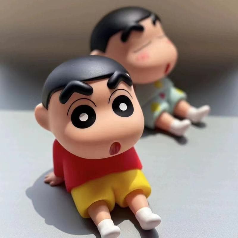 Vendas diretas da fábrica Crayon Shin-Chan suporte do telefone móvel Base preguiçosa figura modelo bonito Desktop orname