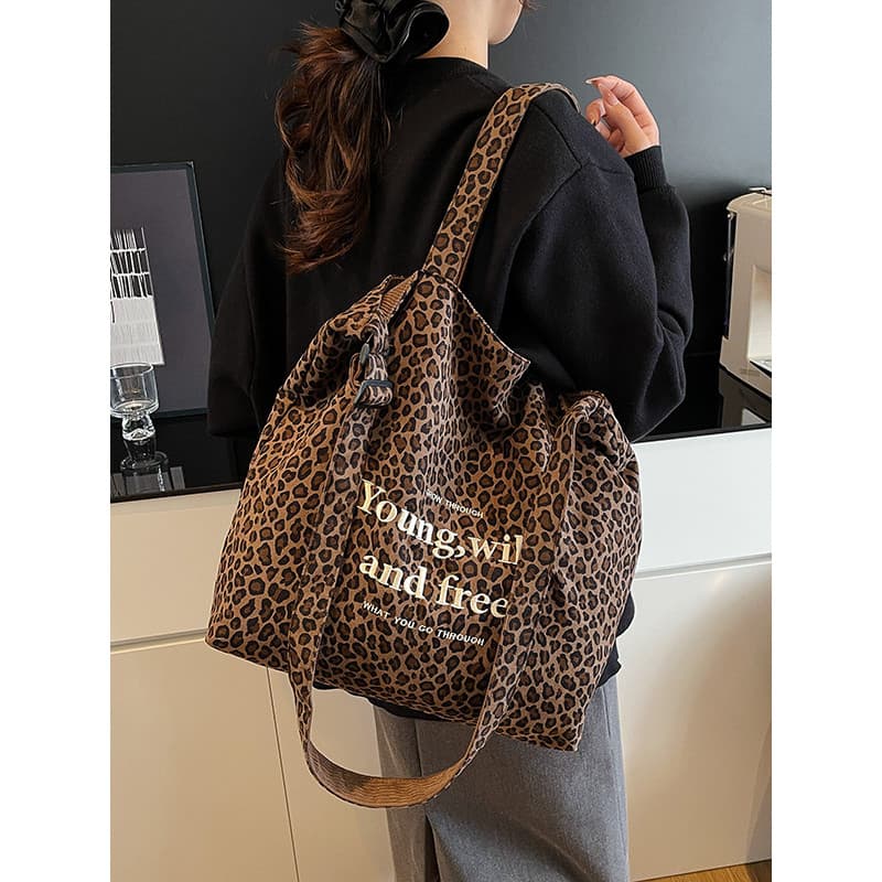 2025 novo estilo leopardo impressão bolsa de lona grande capacidade Casual portátil Commuter ombro sacola estudante clas