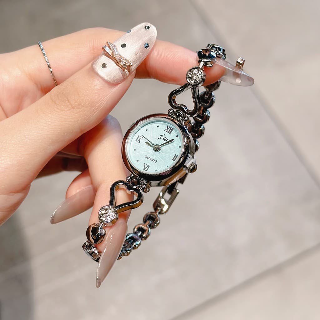 Amor pulseira relógio feminino feminino estudante 2026 novo estilo luz nicho de luxo temperamento de alto valor requinta