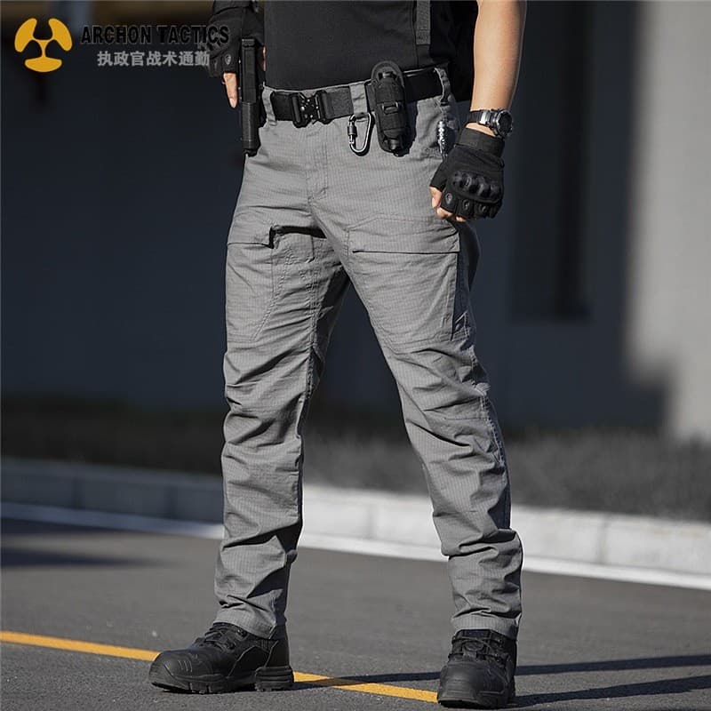 Novo estilo calças táticas masculinas soltas ventilador militar Multi-bolso à prova dwaterproof água estiramento macacão