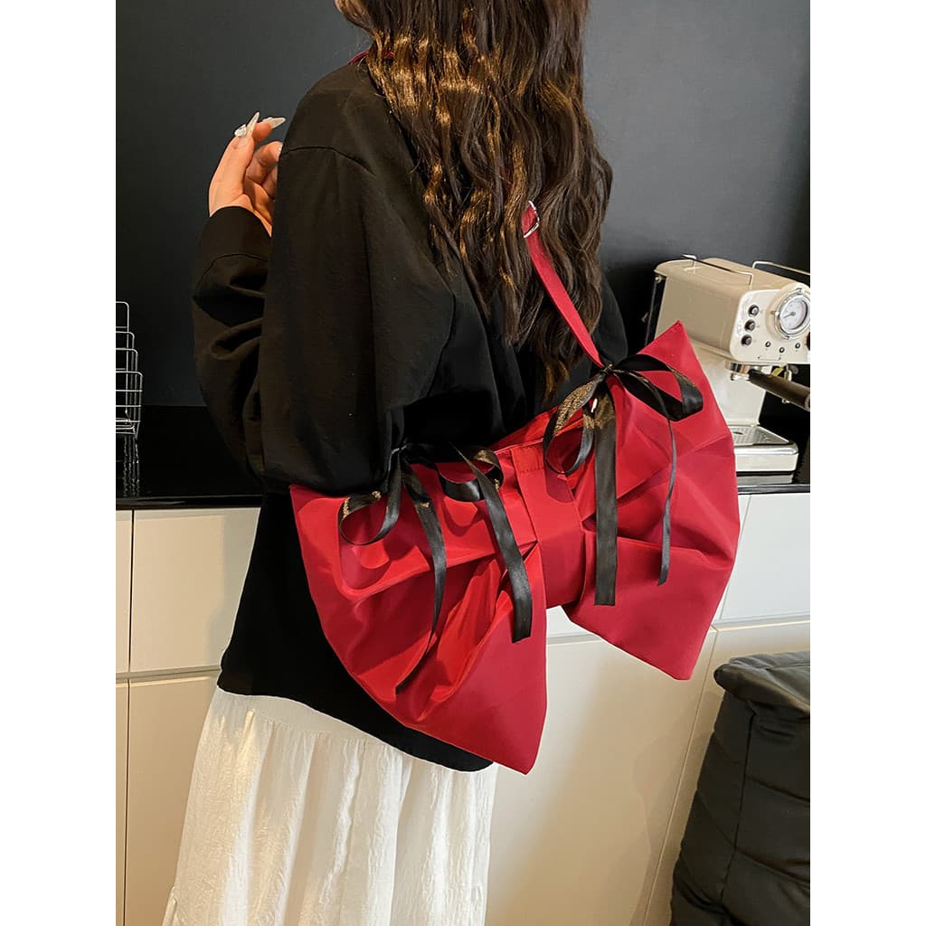Original único Bowknot saco feminino novo estilo nicho cor sólida grande capacidade bolsa de ombro moda menina mensageir