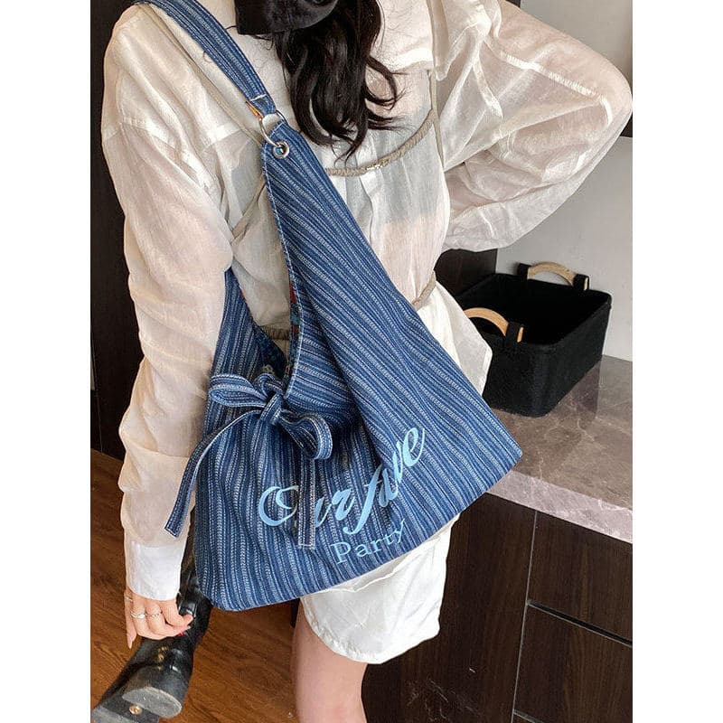 Coreano Casual listrado bolsa de lona feminina 2026 novo estilo moda dupla face Commuter axilas saco de ombro de grande