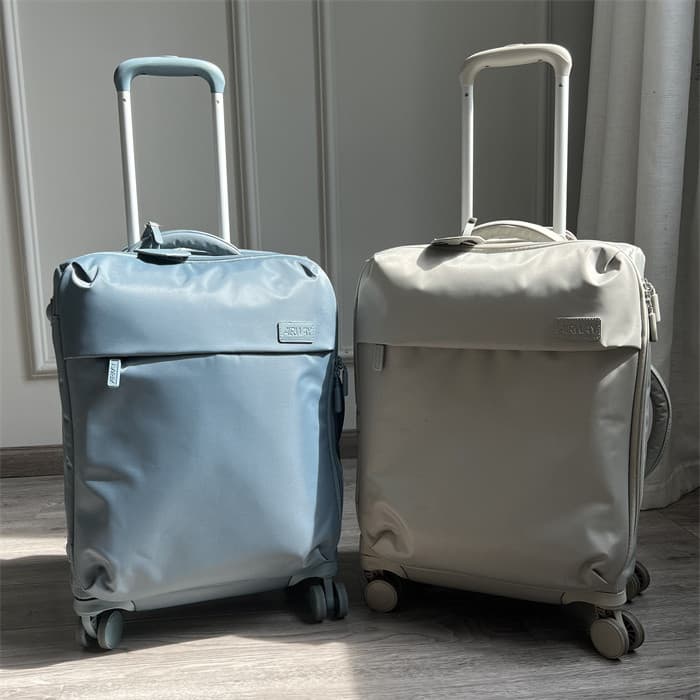 Apenas 2.1KG Ultra-leve Oxford pano caixa de pano de grande capacidade 67cm mala de embarque feminina silenciosa Univers