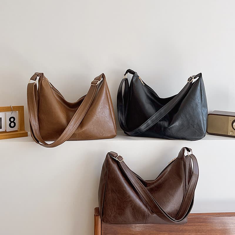 Bolsa de grande capacidade feminina 2024 novo estilo coreano moda couro macio de um ombro axilas saco de trabalho Commut