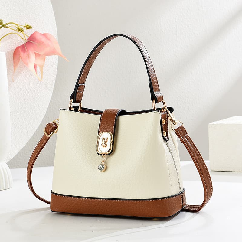 Bolsa feminina 2025 novo estilo Casual Commuter bolsa elegante All-Match um ombro saco do mensageiro nicho textura balde