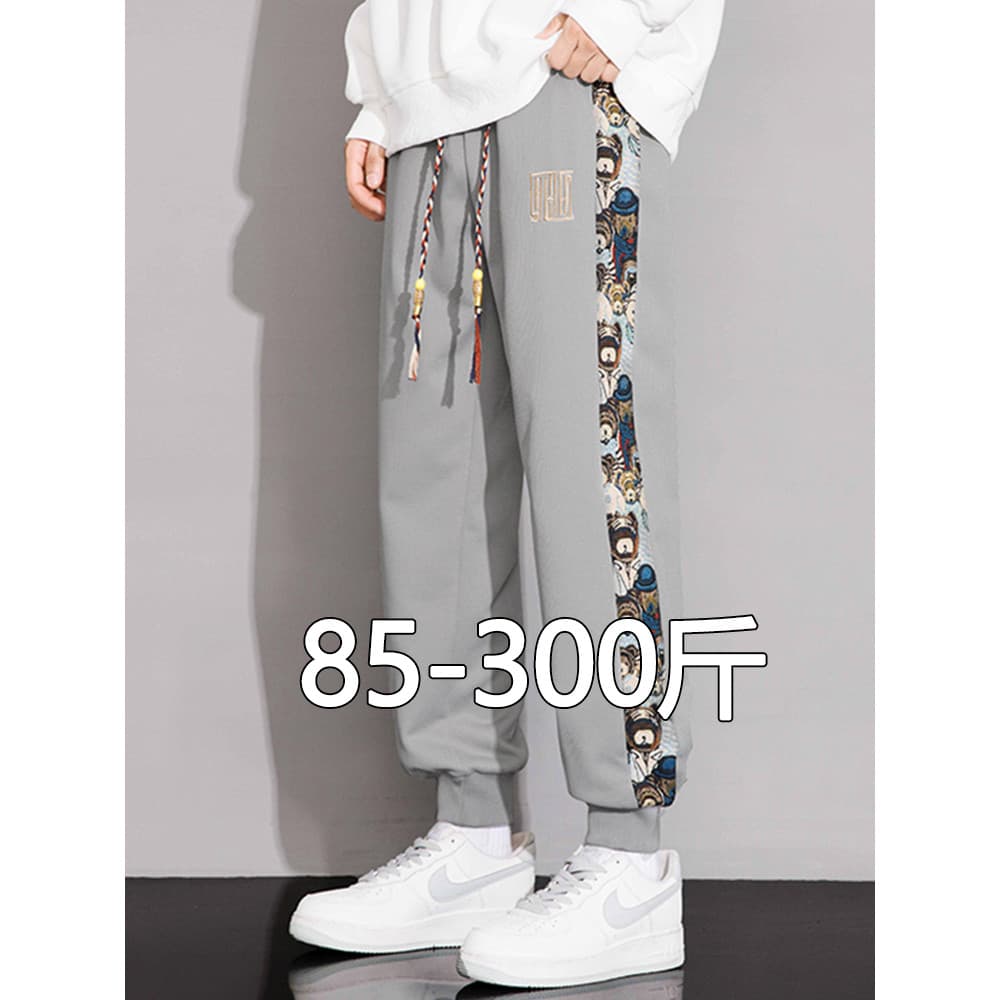 Calças masculinas outono novo estilo tamanho grande nacional na moda impresso pé-banded esportes Sweatpants meninos solt