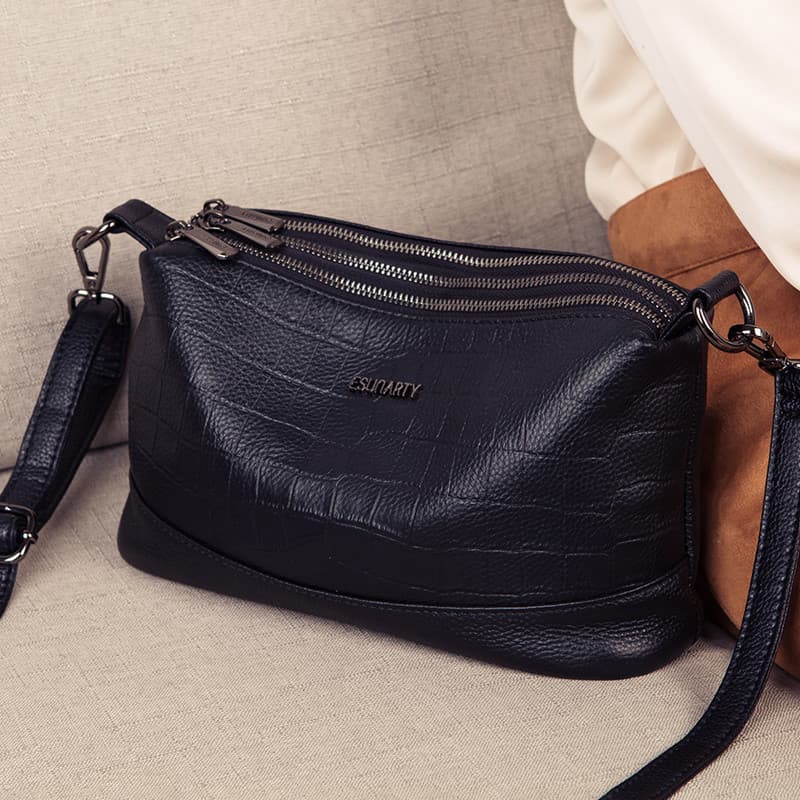 Bolsa feminina de couro genuíno novo estilo 2026 bolsa mensageiro de ombro feminina moda outono bolsa mãe de meia-idade