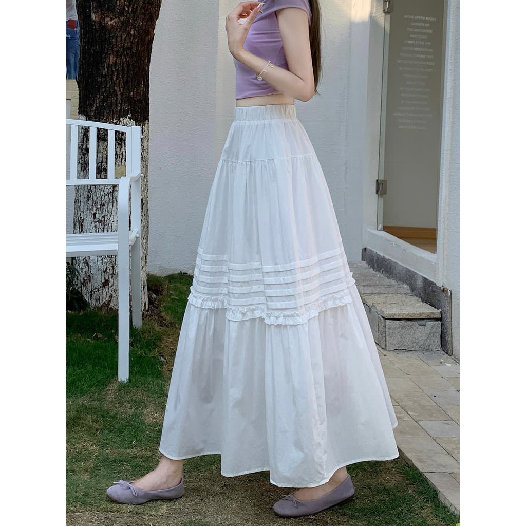 Fungus borda plissada a linha grande bainha saia feminina verão estilo suave temperamento branco pequeno Super fada bolo