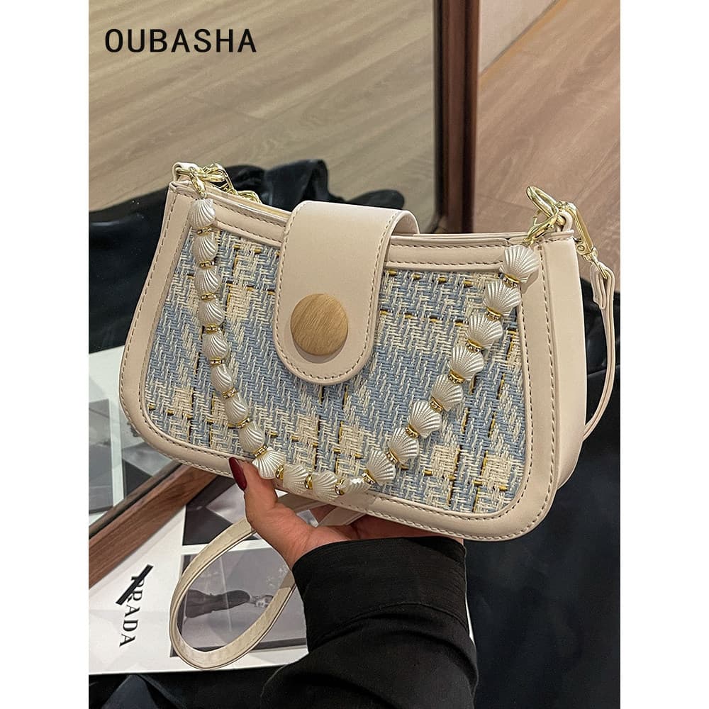 High-End textura saco senhoras 2026 novo estilo verão luz luxo nicho Design mensageiro pequeno quadrado saco de ombro ax