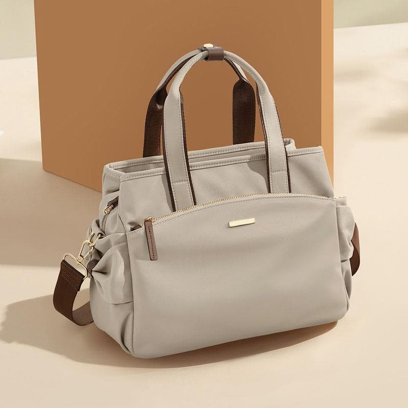 Bolsa feminina 2026 novo estilo moda bolsa de lona grande capacidade bolsa mãe de meia-idade bolsa mensageiro