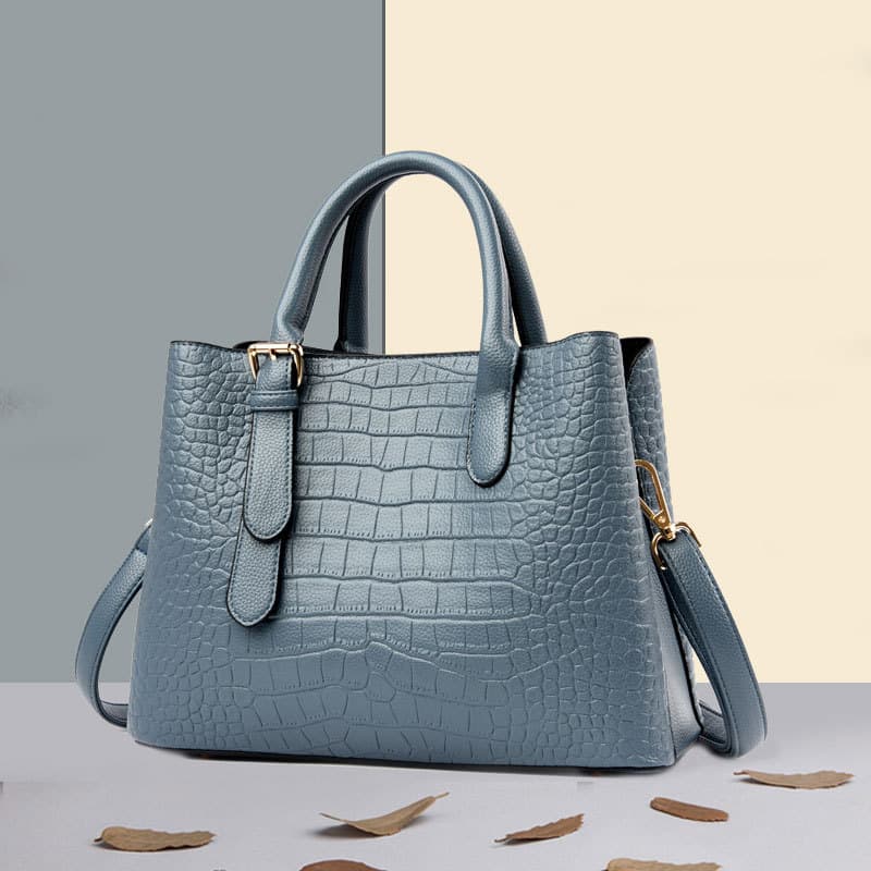 Bolsa de couro genuíno autêntica de Hong Kong feminina 2026 novo estilo sacola portátil de grande capacidade elegante e