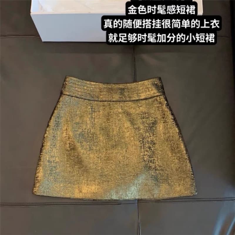 Gilt quente menina brilhante saia dourada 2025 outono cintura alta temperamento novo estilo mais magro olhar a linha Hip