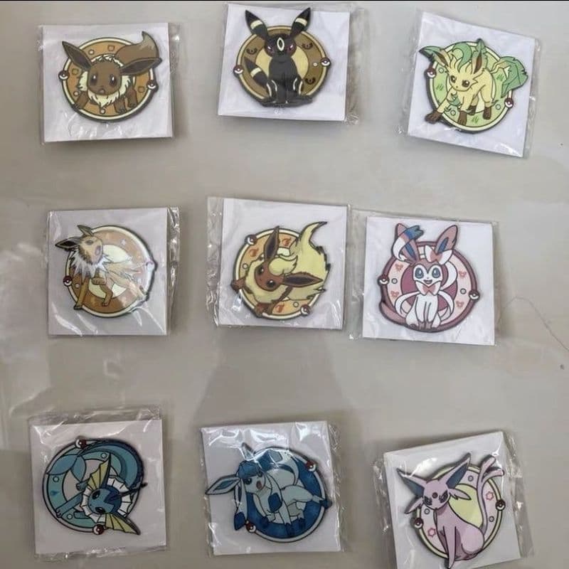 Z Zhuzhou Liying Trading Co., Ltd. Novo produto autêntico Master Kang Perfumado Crocante Pokémon Co-Branded Eevee Badge