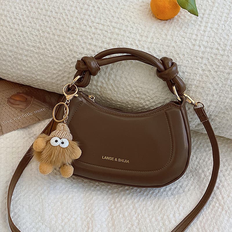 A moda Popular deste ano All-Match influenciador cor sólida atada bolsa 2026 primavera novo estilo versão coreana bolsa