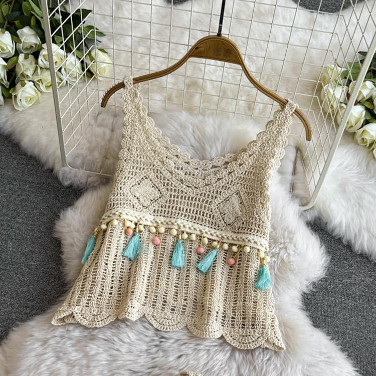 Coreia chique verão férias estilo étnico estilingue feminino 2025 novo estilo Design de malha oco borla colete de algodã