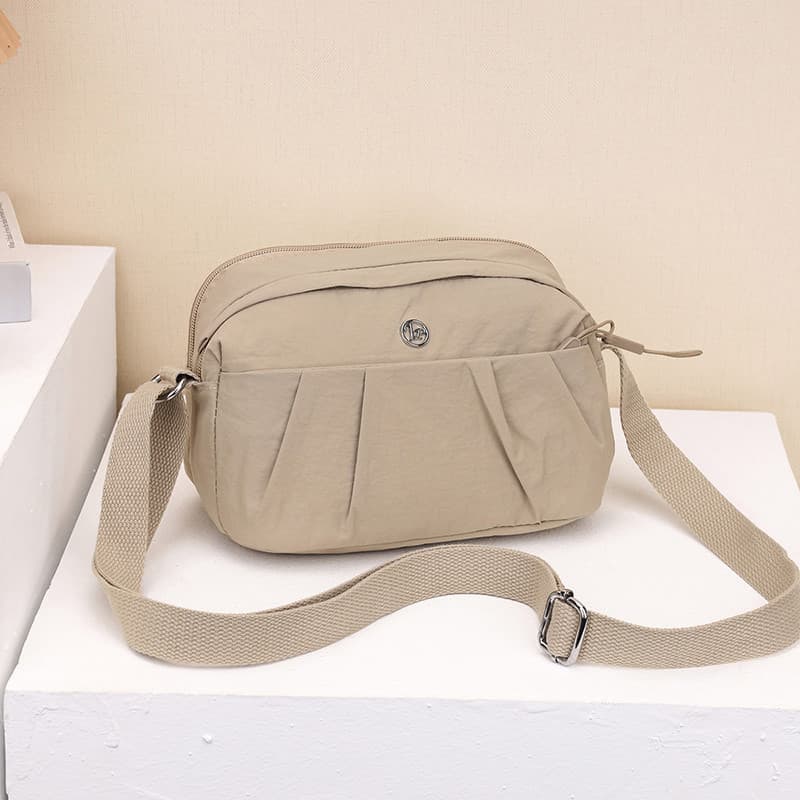 Bolsa mensageiro 2025 novo estilo versão coreana All-Match na moda náilon Multi-camada senhoras pequena mochila saco mod