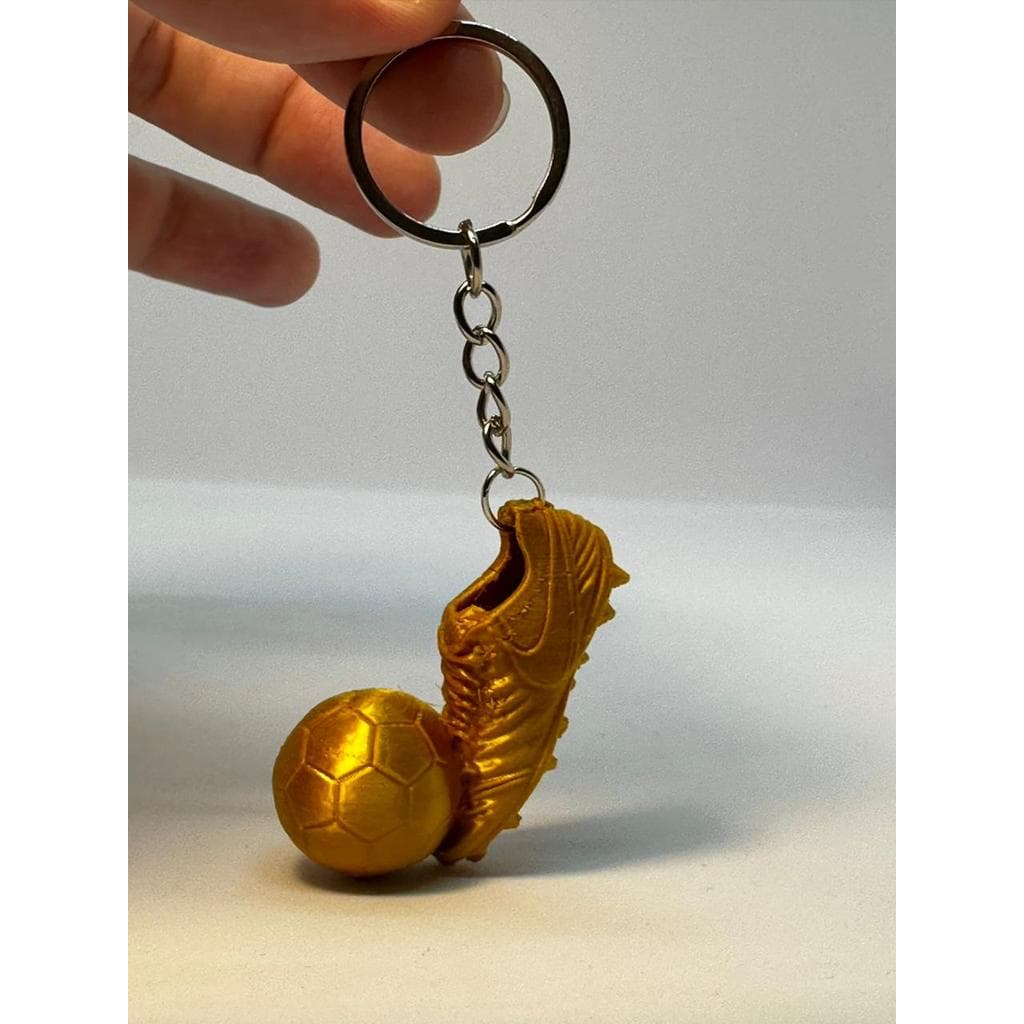 Chaveiro Chuteira de Ouro: Sinta a Emoção da Copa do Mundo com Você!