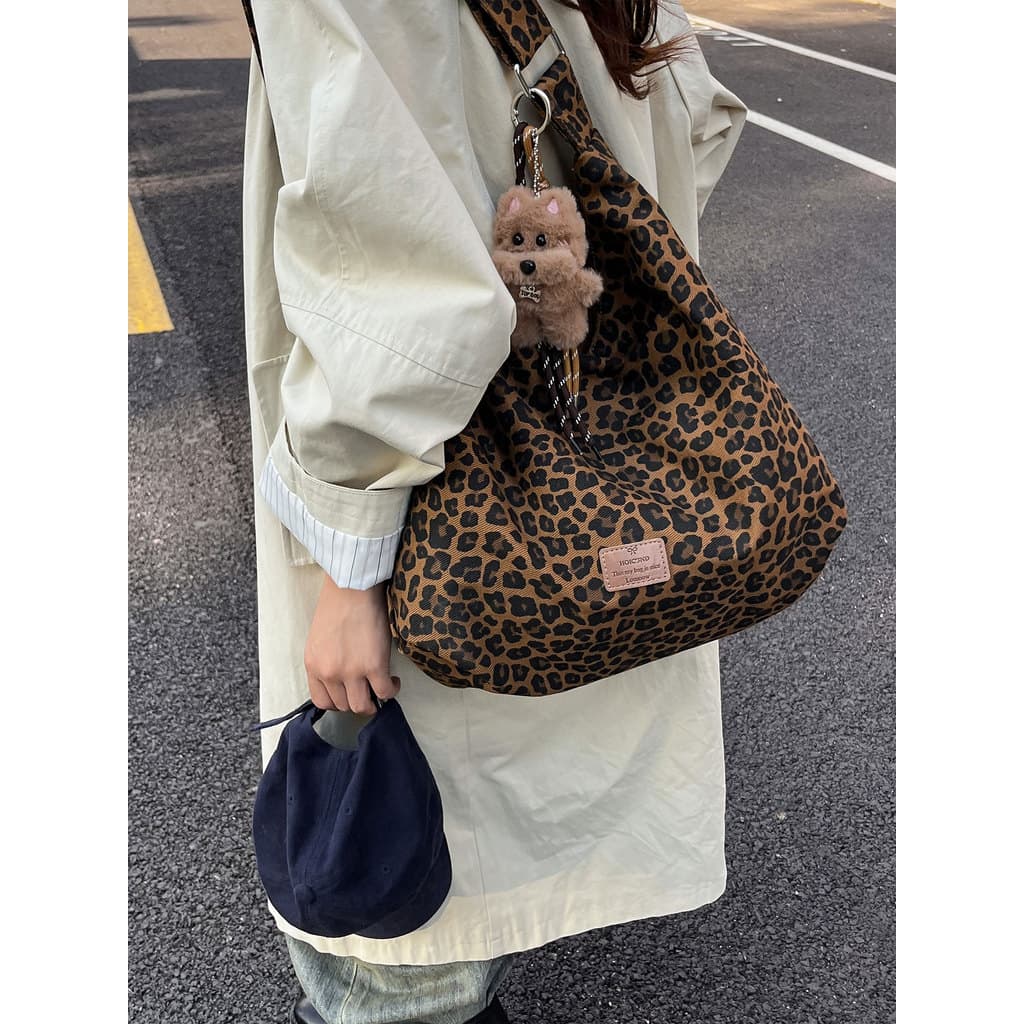 Bolsa de lona mensageiro com estampa de leopardo de grande capacidade feminina 2026 novo estilo moda bolsa de ombro Casu