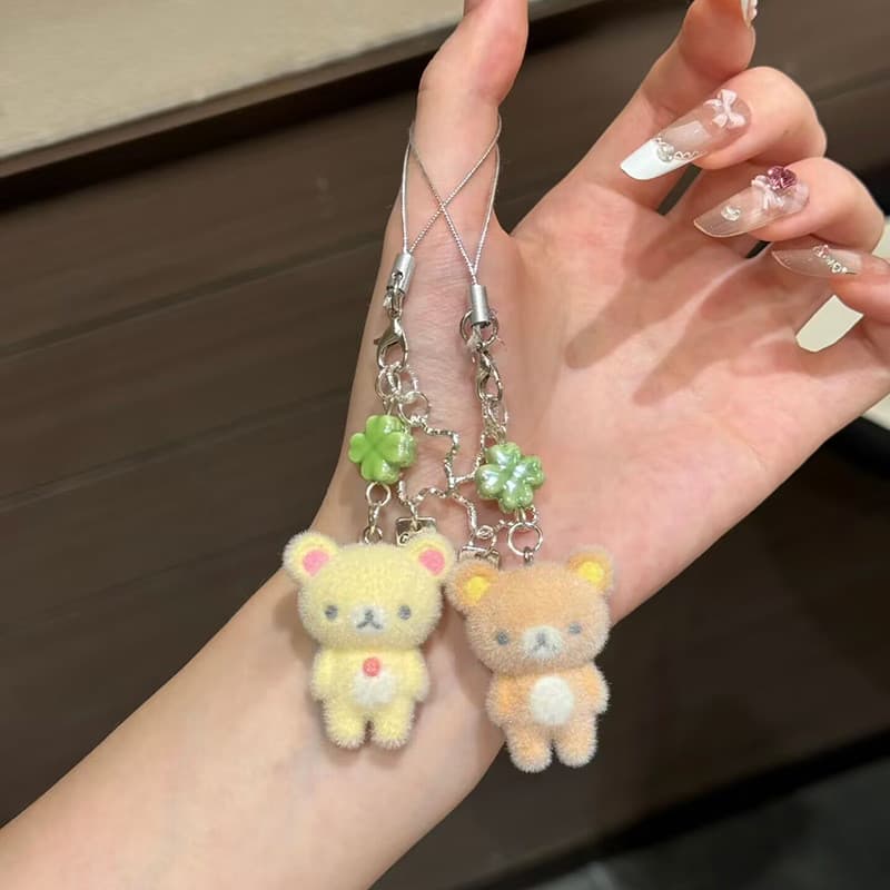 Bonito reunindo pequeno urso branco Rilakkuma pingente de telefone móvel chaveiro trevo de quatro folhas pingente câmera