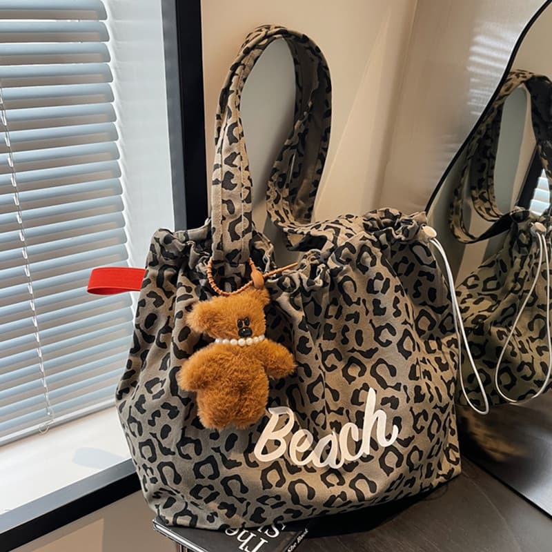 Bolsa de lona com estampa de leopardo feminina outono inverno 2026 novo estilo nicho grande capacidade estudantes univer