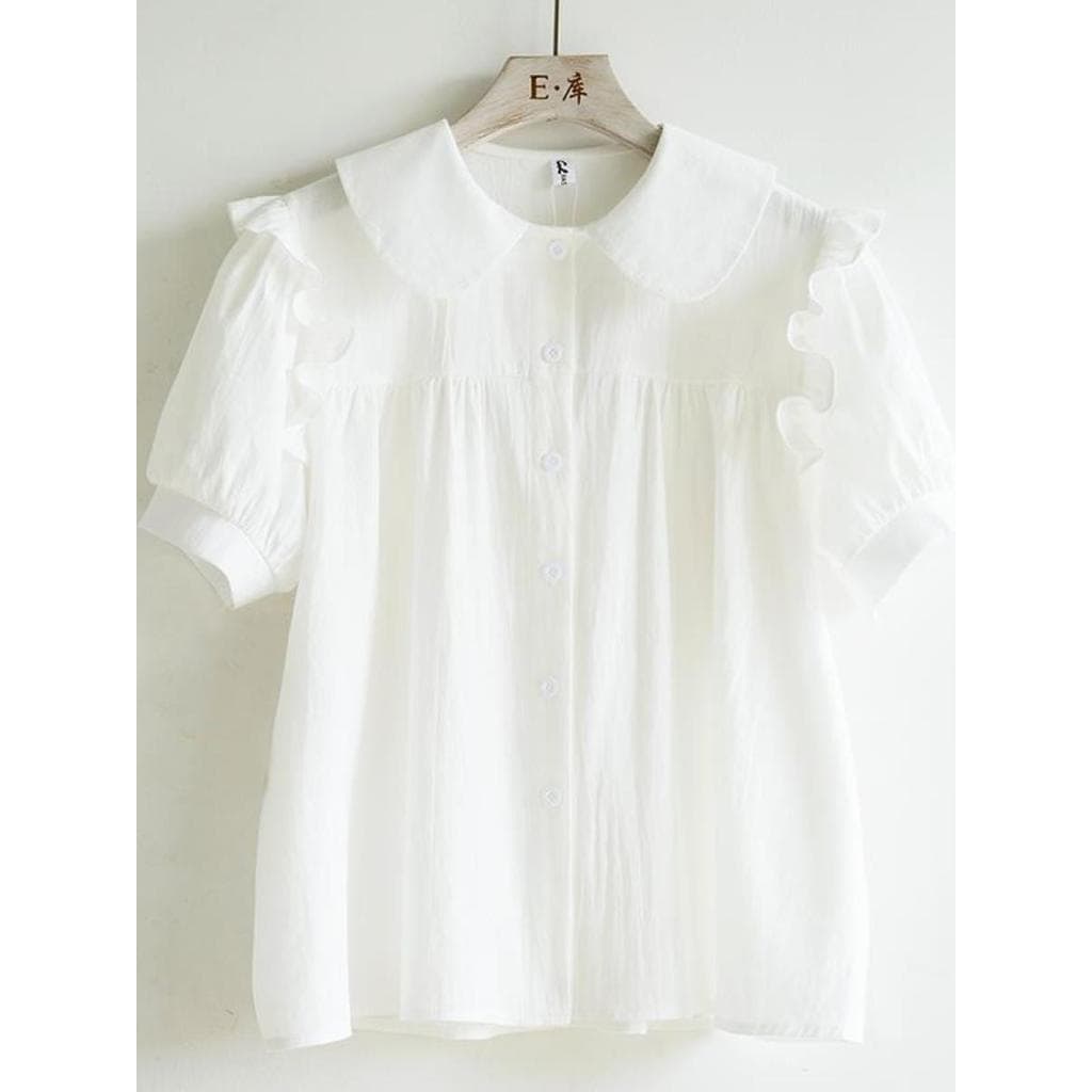 Camisa branca francesa feminina pequena verão fresco 2026 novo estilo palácio estilo fungo borda boneca gola de manga cu