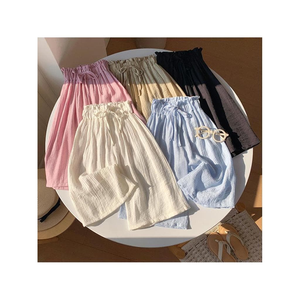 Novo estilo coreano meninas soltas Shorts de perna larga verão algodão linho respirável crianças calças casuais cor doce