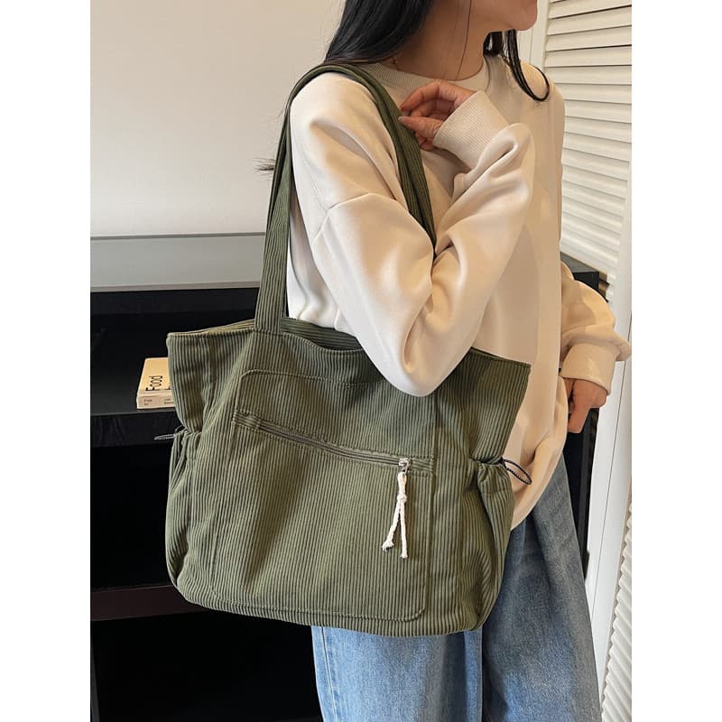 Sacola de flanela listrada feminina de grande capacidade All-Match Casual 2026 novo estilo bolsa de ombro de veludo Col