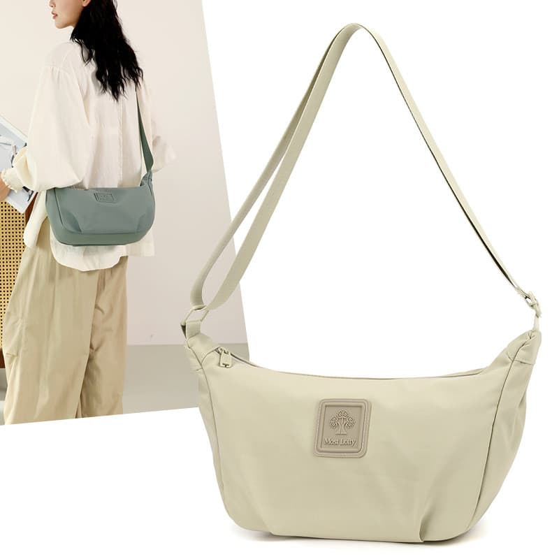 Influencer bolsa mensageiro pequena feminina 2026 novo estilo na moda bolsa masculina moda bolinho Casual bolsa de lona