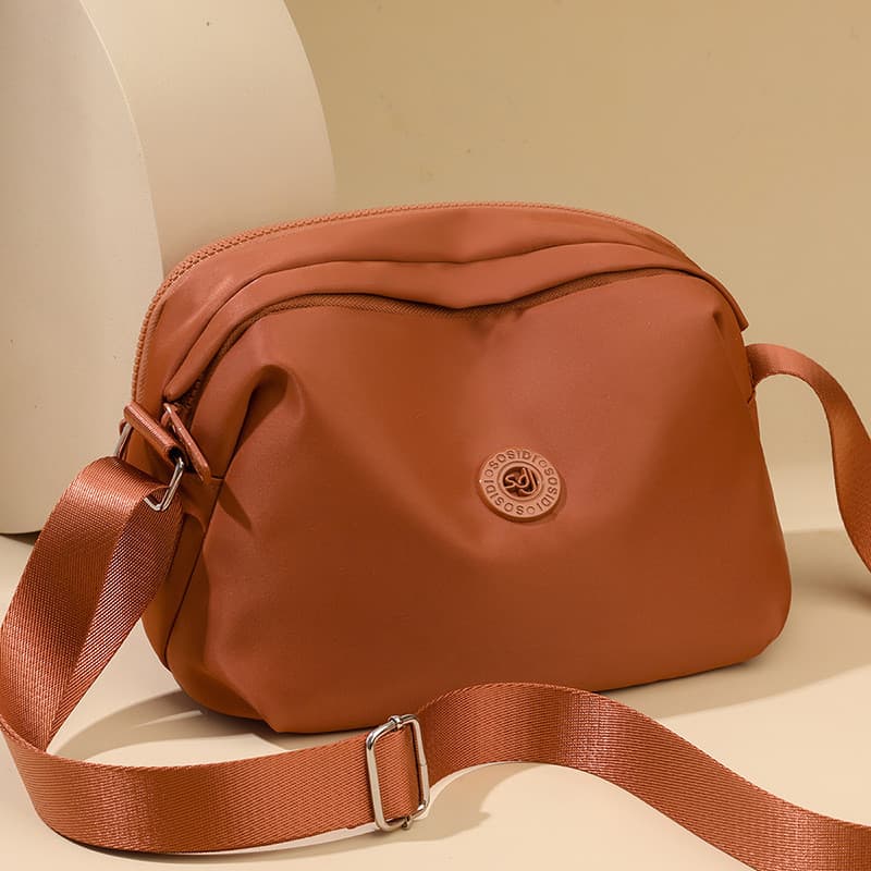 Bolsa feminina 2026 primavera novo estilo urbano simples saco de pano de náilon de um ombro Casual mãe saco moda leve sa