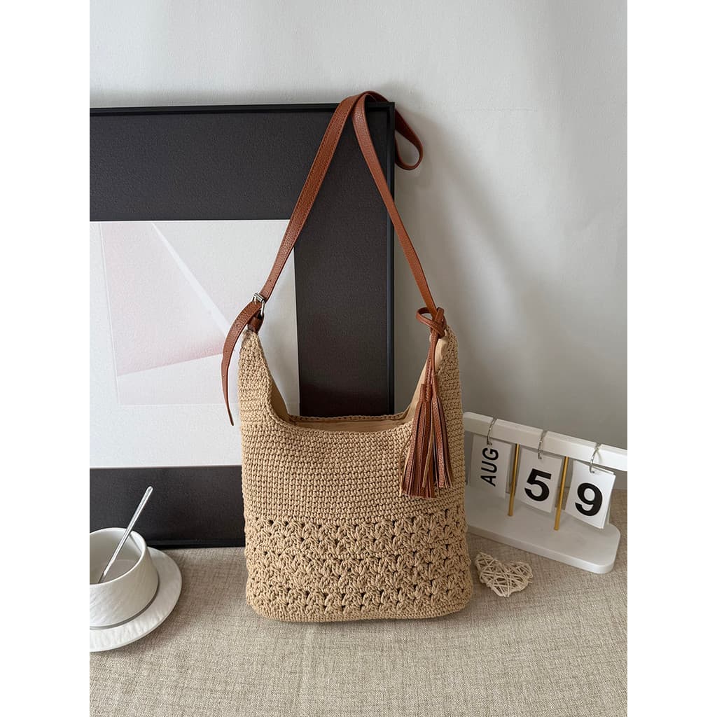 Novo estilo borla tecido saco de um ombro oco saco Casual mensageiro praia férias moda feminina