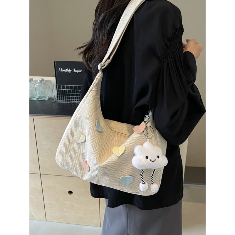 Nicho bolsa de lona feminina 2024 novo estilo na moda ins coreano moda All-Match bolsa de ombro pêssego coração Commuter