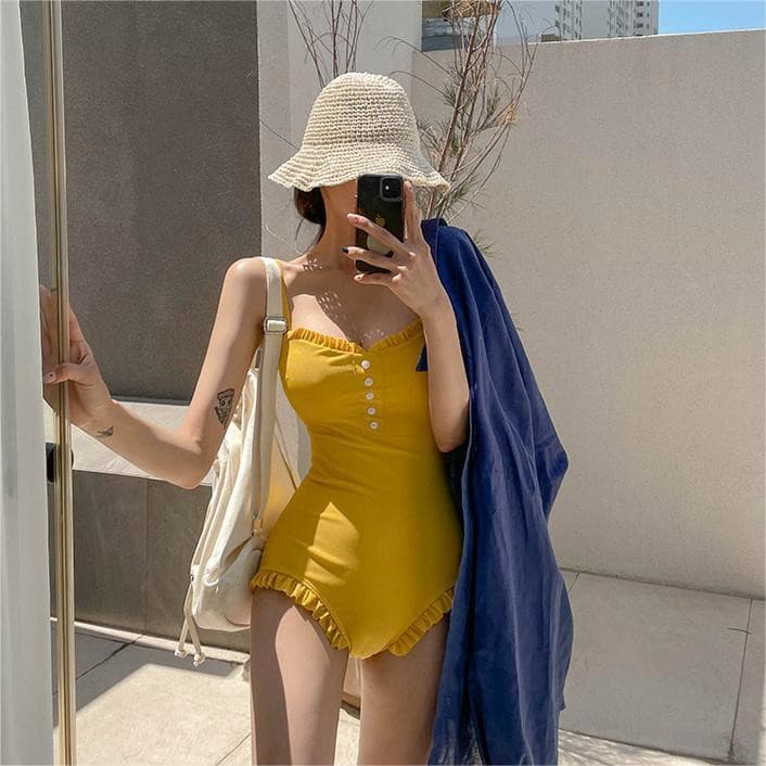 Maiô 2026 novo estilo feminino primavera quente feminino puro desejo estilo pequeno amarelo estilingue de uma peça estil
