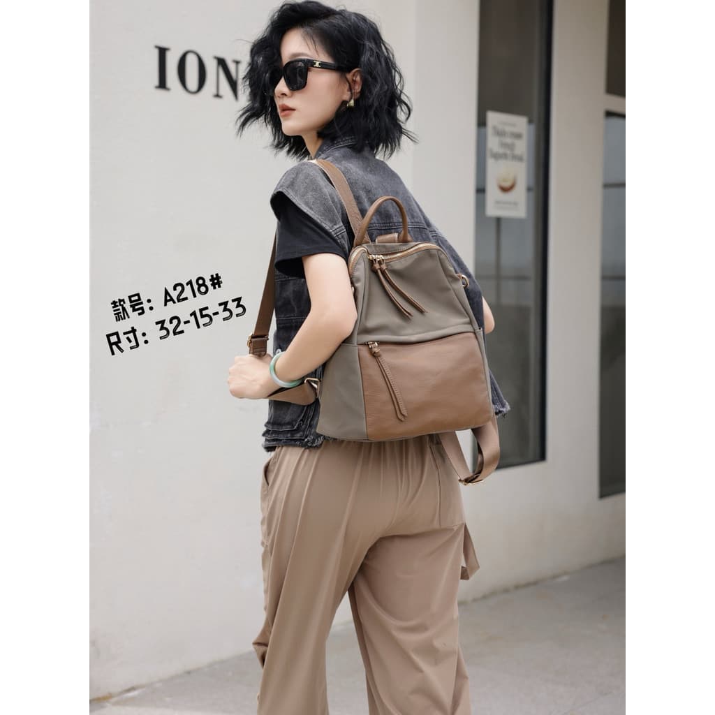 Mochila feminina 2026 novo estilo moda grande capacidade mochila de viagem feminina leve Oxford pano lona com primeira c