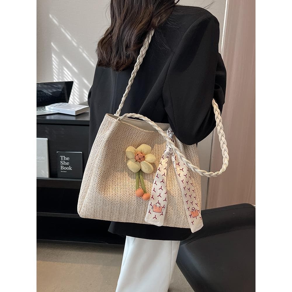 Bolsa de palha tecida feminina grande capacidade 2024 novo estilo verão portátil bolsa de ombro à beira-mar bolsa de omb