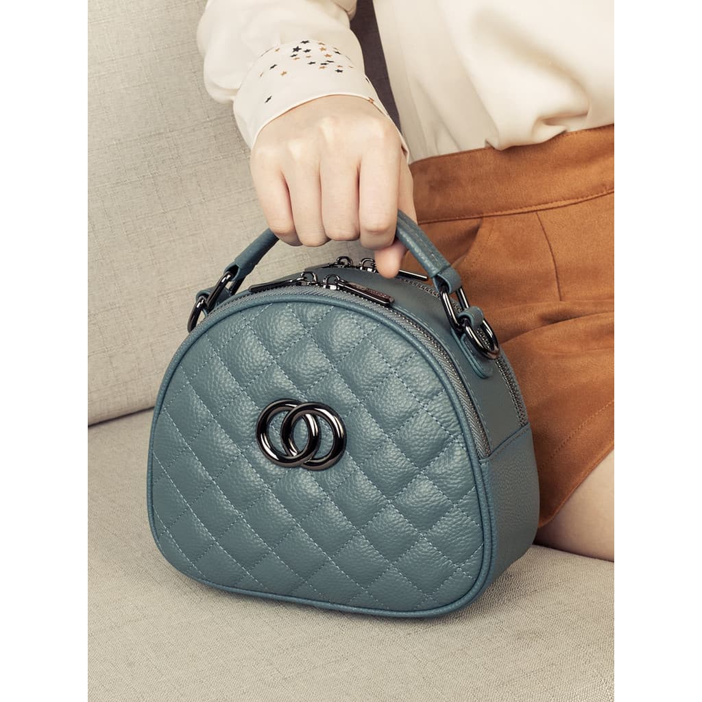 High-End estilo ocidental pequeno saco 2025 novo estilo moda diamante couro genuíno de um ombro pequeno saco redondo fem