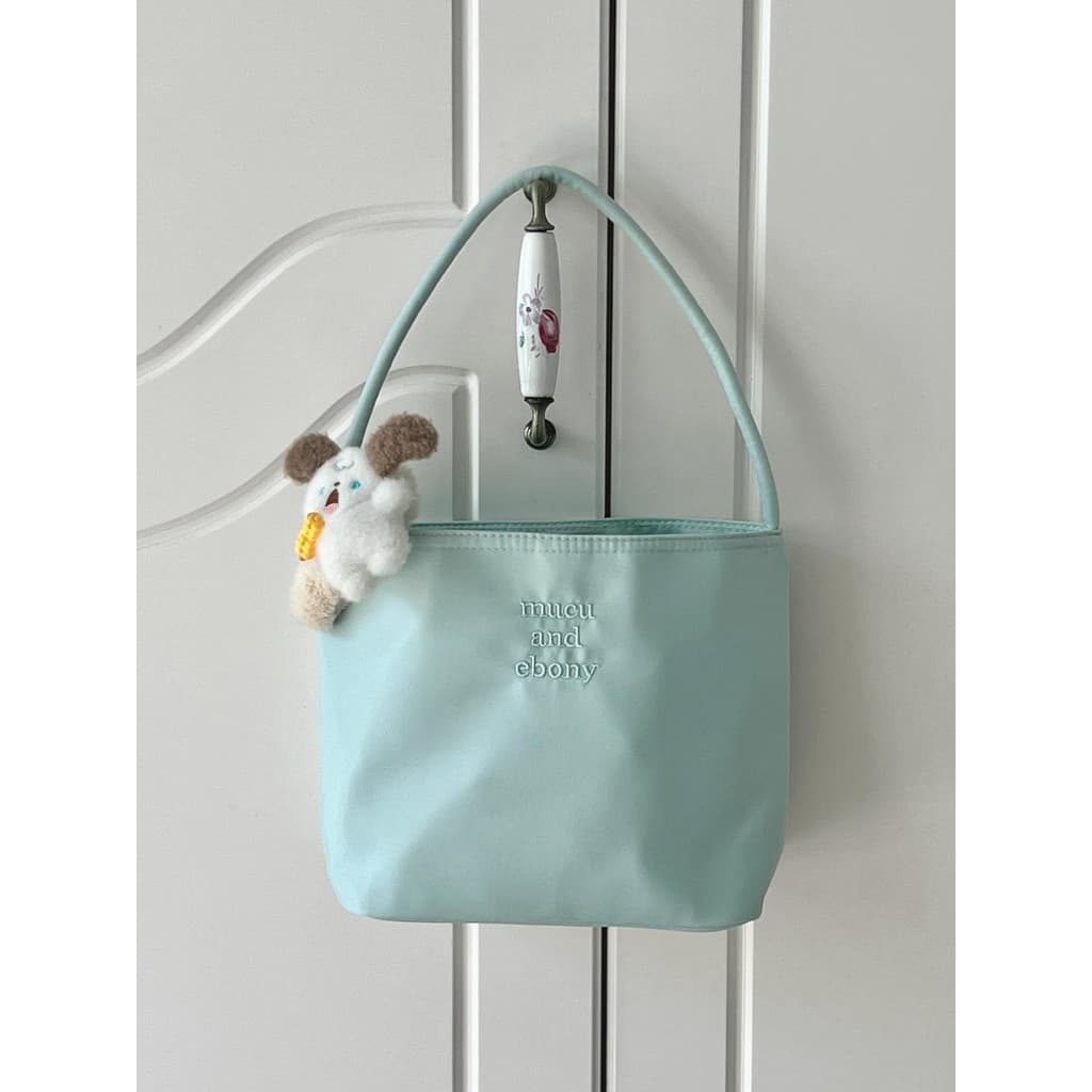 Pano de náilon feminino 2026 novo estilo verão nicho Design sentido bolsa de ombro estilo coreano lona mão-transporte ba