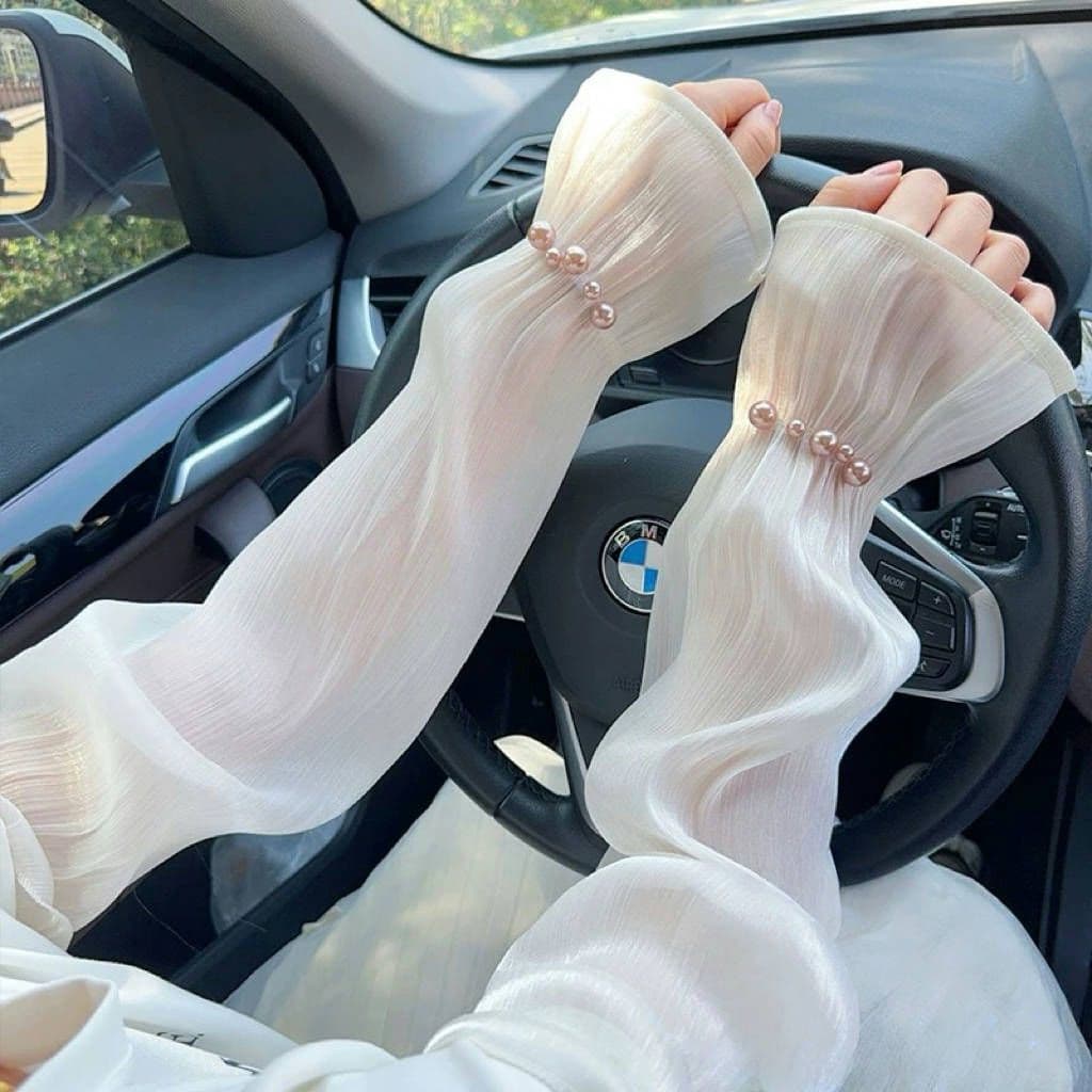 Verão protetor solar feminino mangas de gelo novo estilo mangas soltas ao ar livre ciclismo condução mangas ultravioleta