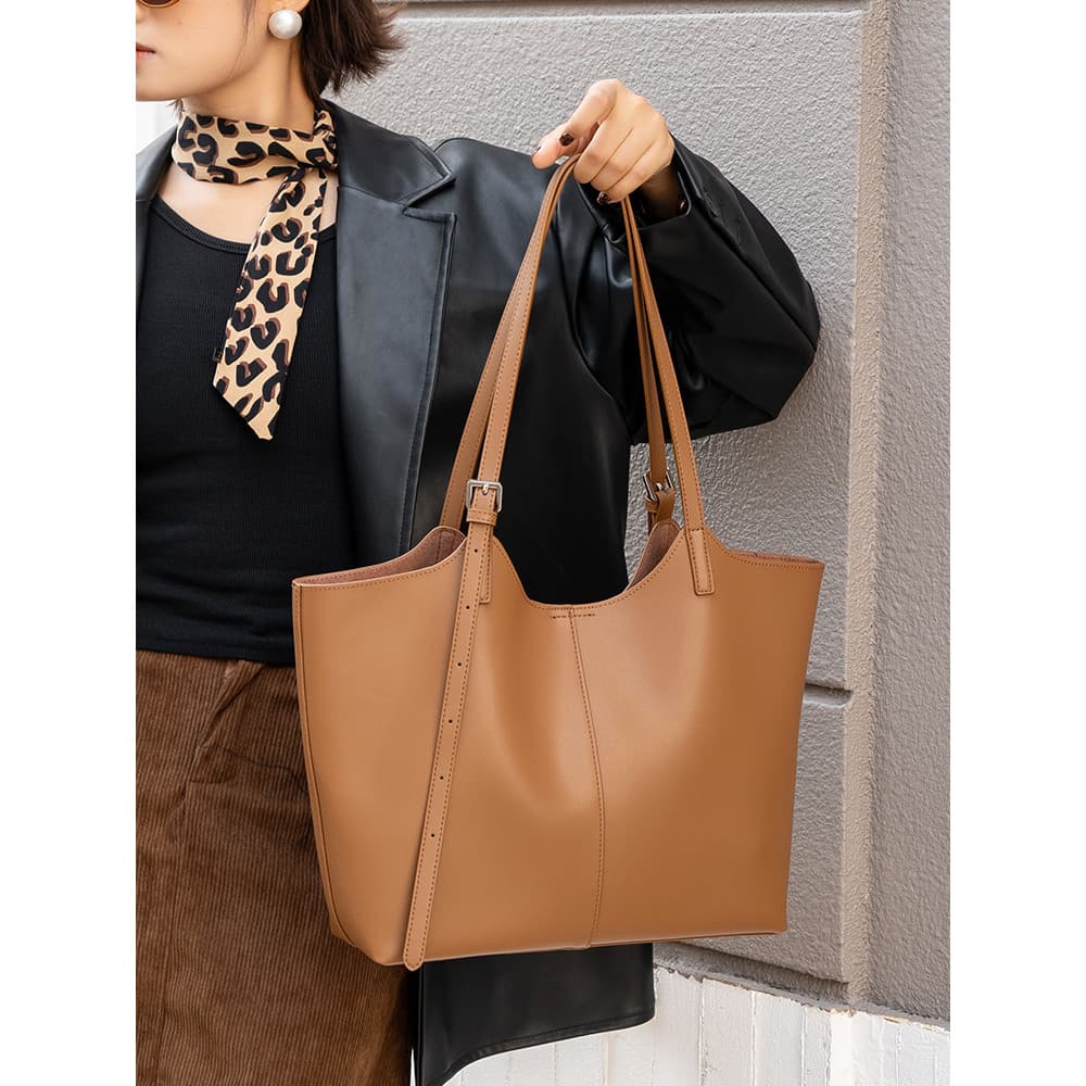 Bolsa Tote de couro genuíno feminina 2026 novo estilo simples All-Match bolsa feminina axilas grande capacidade Commuter
