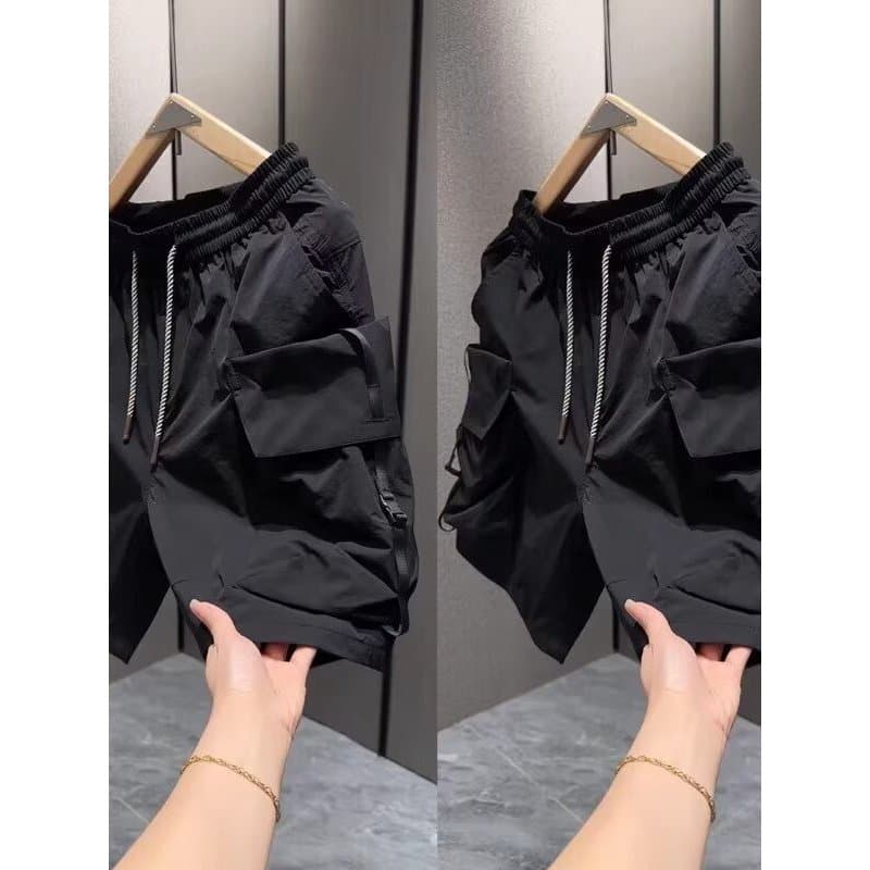 Luz Design de luxo sentir calças cortadas masculino All-Match secagem rápida grande bolso Shorts na moda 2026 verão novo