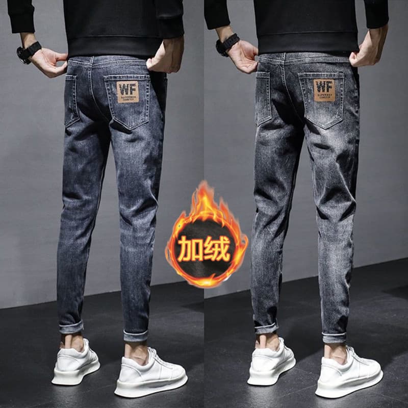 Calças de brim masculinas na moda na moda 2025 novo estilo forro de lã engrossado fino-ajuste pés pequenos preto calças