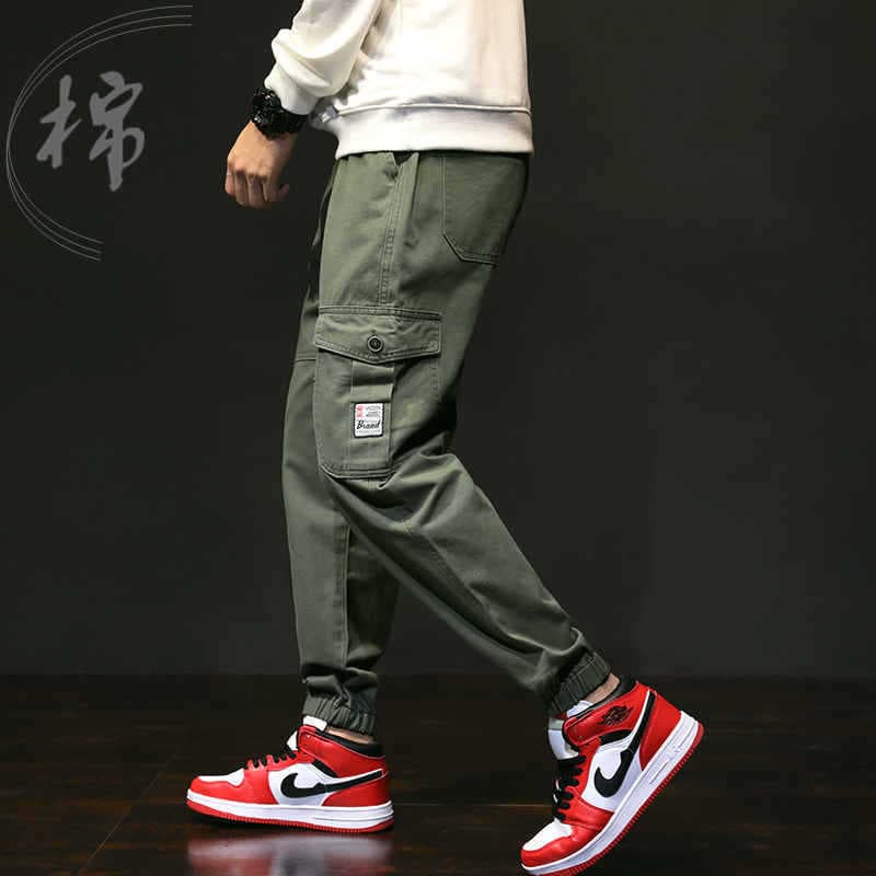 Leggings de verão macacão masculino estilo japonês Street Wear juventude estilo Hong Kong solto Harem esportes Multi-sac