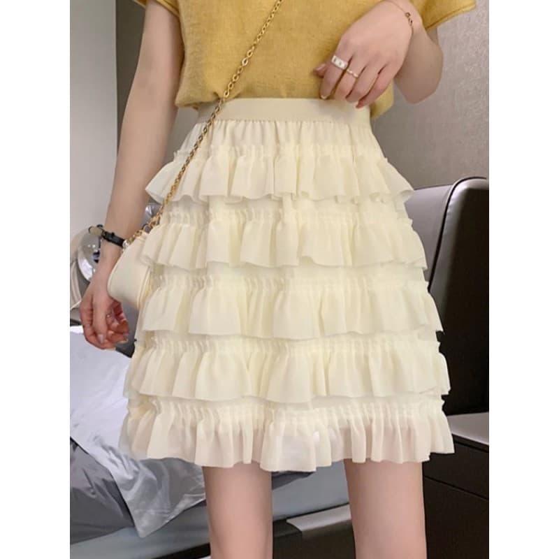 Saia de bolo branco feminina verão Super fada personagem Design fofo pequena saia curta francesa Irregular