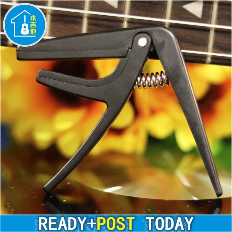 4 Cordas Guitarra Havaiana capo ukulele Uma Mão Mudança Rápida Clipe
