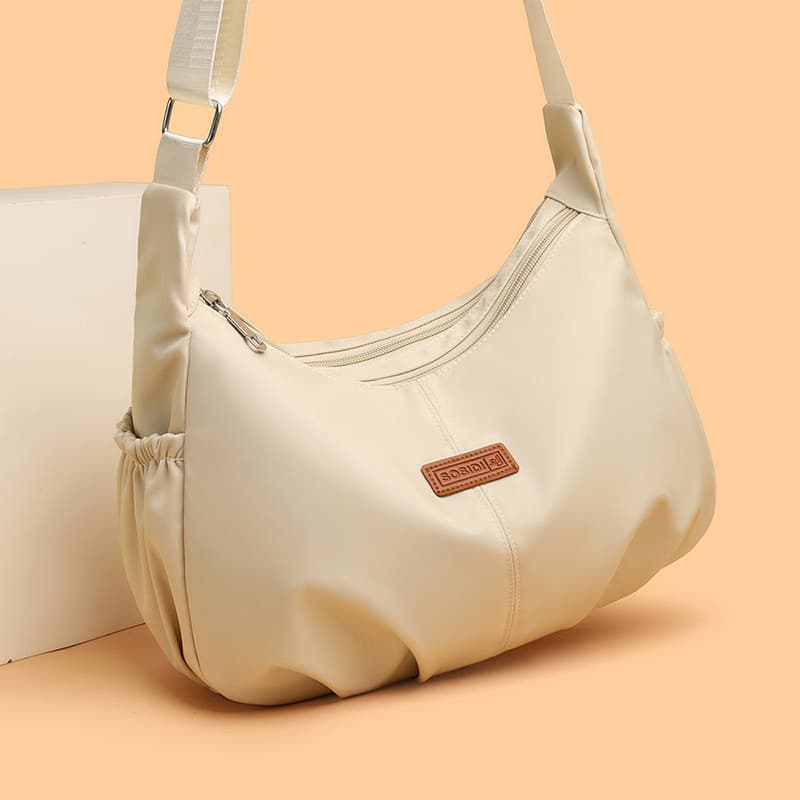 2025 novo estilo bolsa mensageiro feminina bolsa de ombro versão coreana Casual bolinho bolsa de ombro High-End senhoras