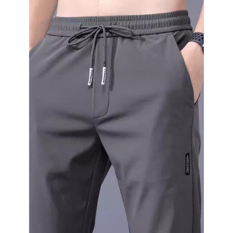 Calças casuais de seda gelo masculinas verão estilo fino na moda calças de secagem rápida masculino venda quente solto e