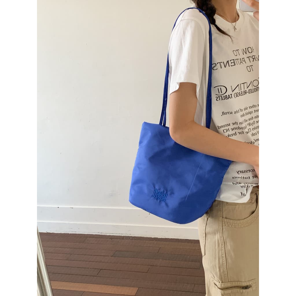 Bolsa de lona de grande capacidade estilo coreano ins2026 novo estilo trabalho Commuter saco azul Casual axilas saco fem