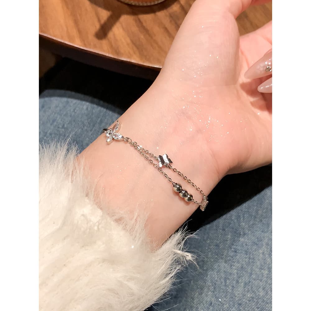 Pulseira banhada a prata de cobre para meninas novo estilo borboleta zircão pulseira luz luxo nicho pulseira requintada